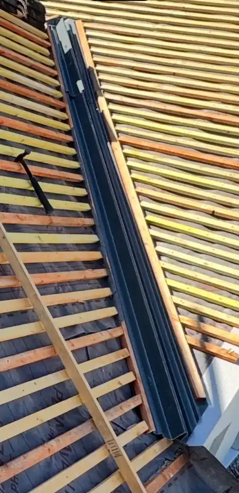 Dry valley fitted between new battens on a re-roof