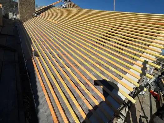 New timber battens fixed over roofing membrane on the Farnham roof