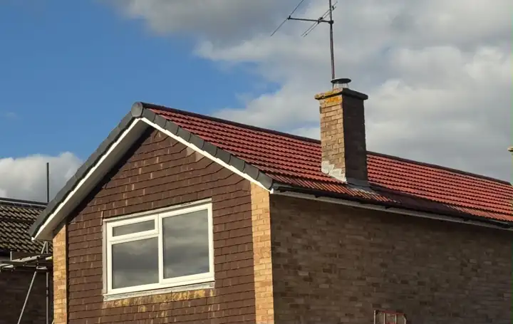 Ripley new roof finished in rustic red Redland 49 tiles